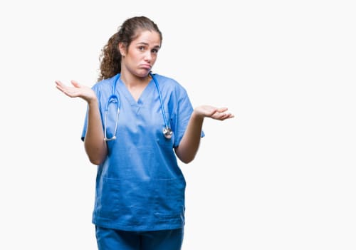 Nurse with her hand up in an I don't know gesture