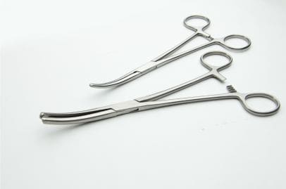 A large and small pair of forceps