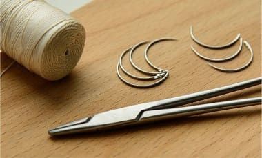 Suturing needles, thread and tools