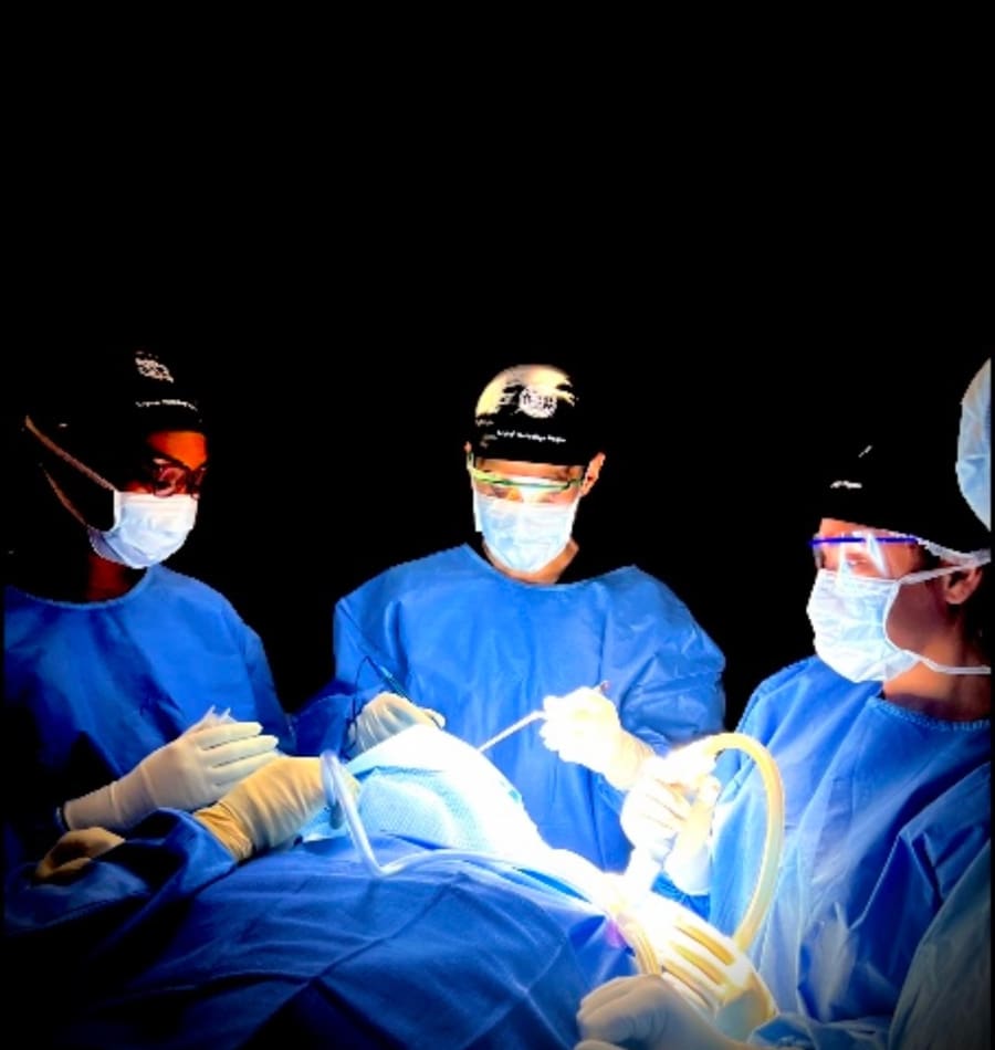 Surgical technology students practicing in a mock OR